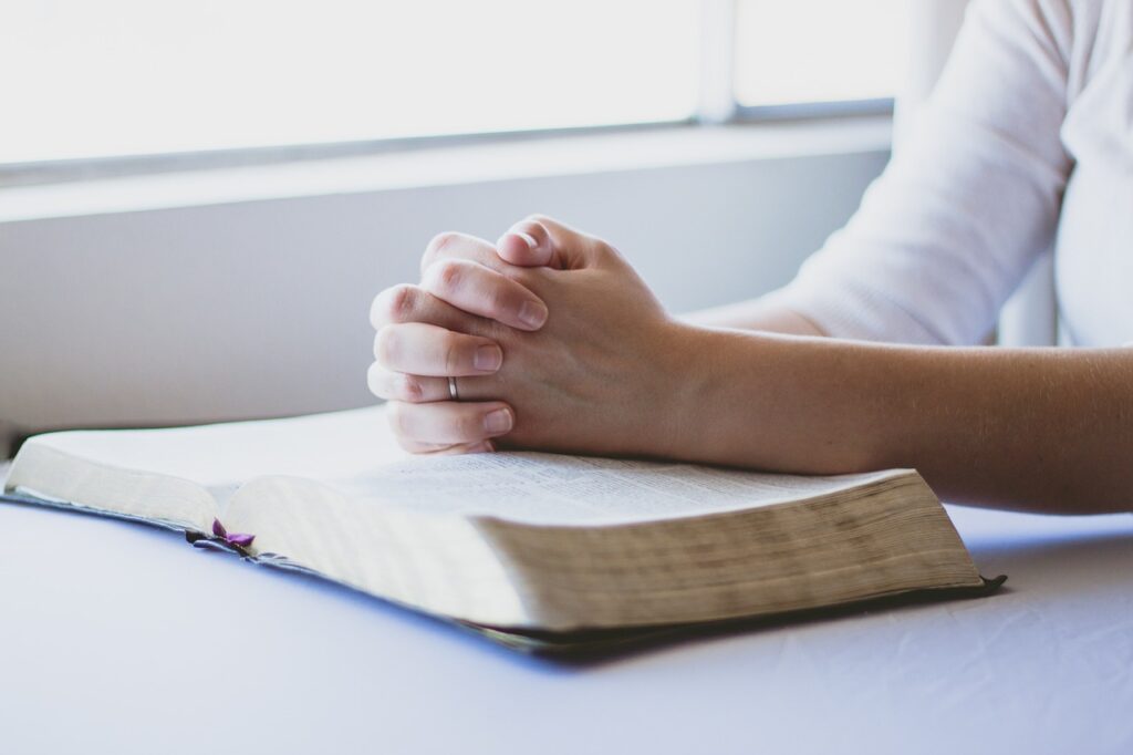 prayer bible christian folded hands 1308663